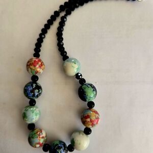 Black and Red Beaded Necklace with Unique Textures